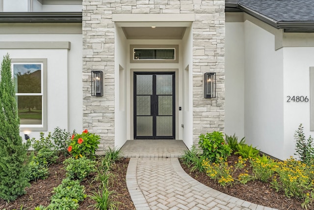 doorway to property with french doors