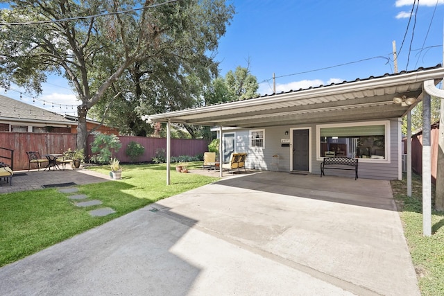 exterior space featuring a yard and a patio area