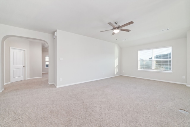 carpeted empty room with ceiling fan