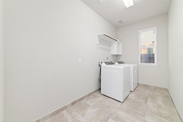 laundry area with washer and dryer