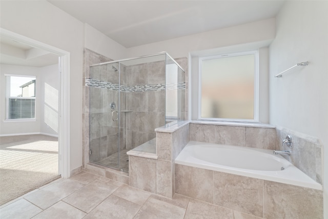 bathroom featuring tile patterned floors and plus walk in shower