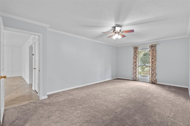 empty room with ceiling fan, ornamental molding, light carpet, and a textured ceiling