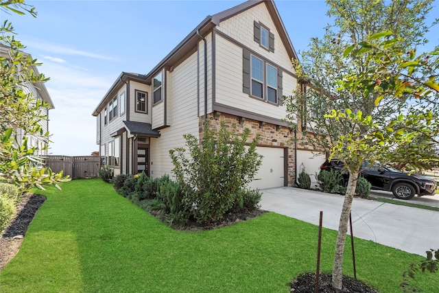 view of side of property with a lawn and a garage