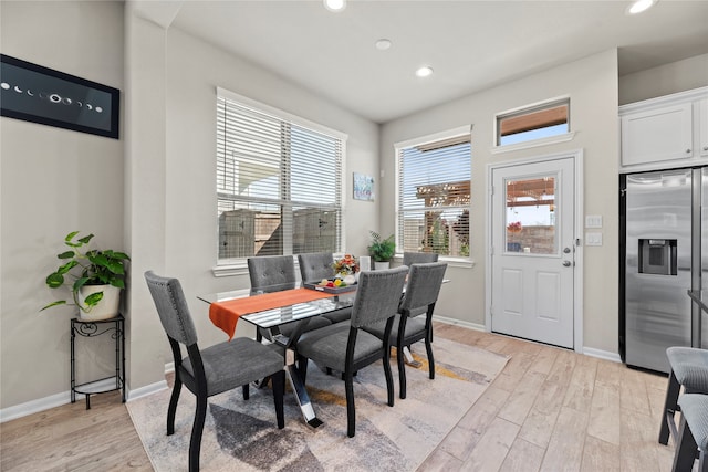 dining room featuring light hardwood / wood-style flooring