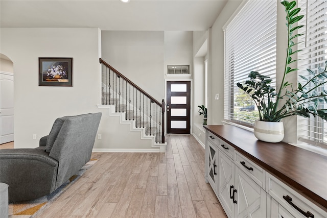 foyer with light wood-type flooring