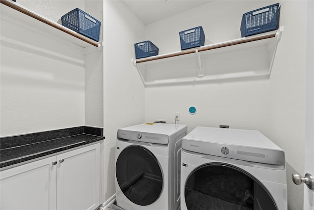 clothes washing area with independent washer and dryer