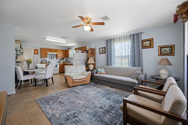 living room with ceiling fan