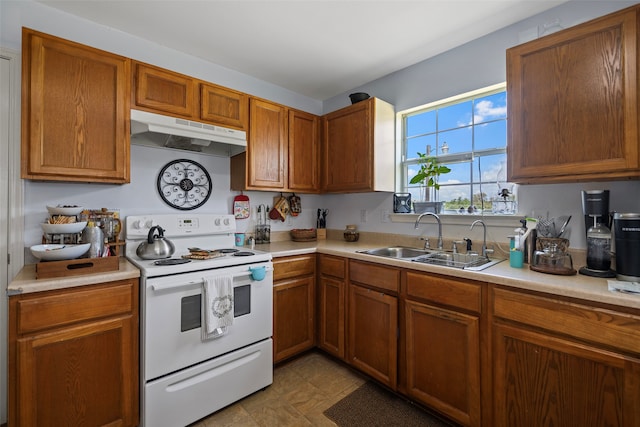 kitchen with sink and electric range