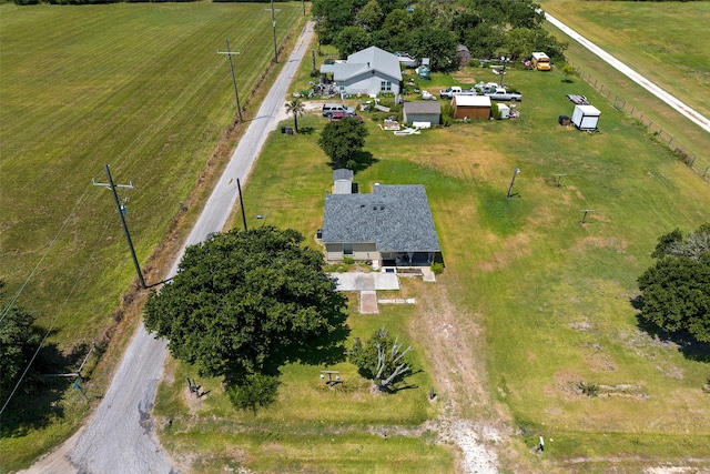 birds eye view of property featuring a rural view