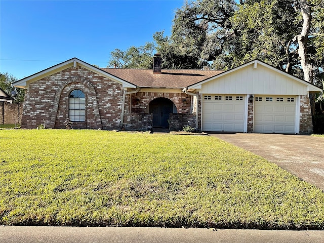 single story home with a front yard and a garage