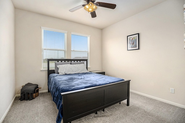 bedroom featuring ceiling fan and light colored carpet