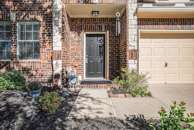 property entrance with a garage