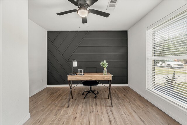 office area with ceiling fan and light hardwood / wood-style flooring