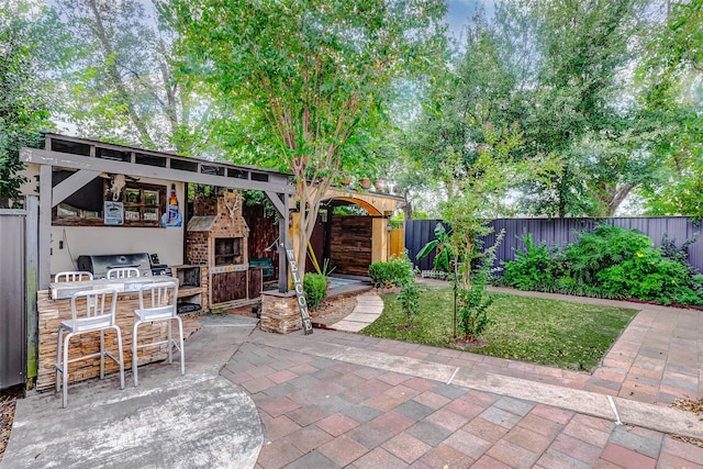 view of patio / terrace featuring a gazebo and a bar