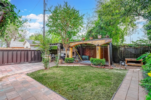 view of yard with a gazebo and a patio area