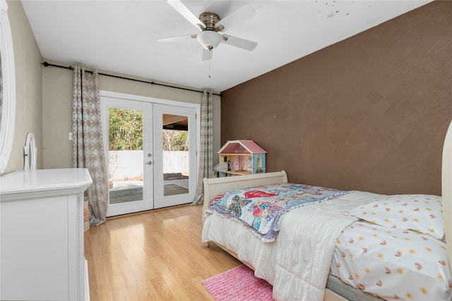 bedroom with french doors, light hardwood / wood-style floors, access to outside, and ceiling fan