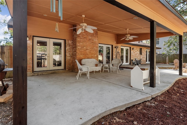 view of patio with french doors and ceiling fan