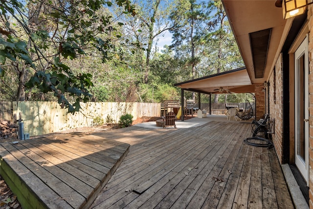 wooden deck with ceiling fan