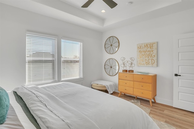 bedroom featuring ceiling fan and hardwood / wood-style floors