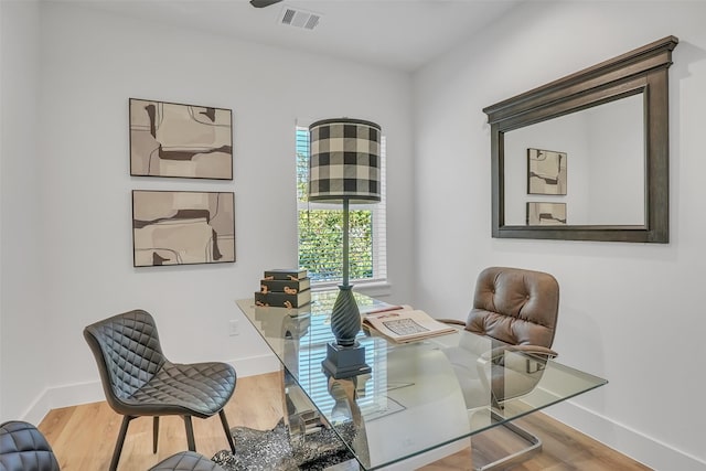 office area with hardwood / wood-style flooring