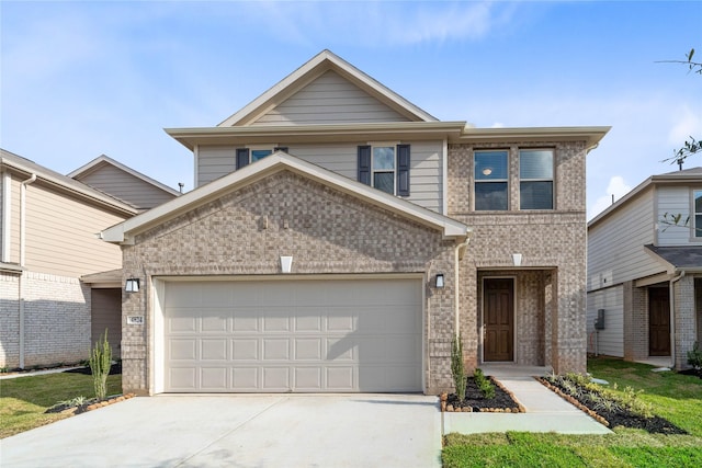 view of front of property with driveway, a garage, and brick siding