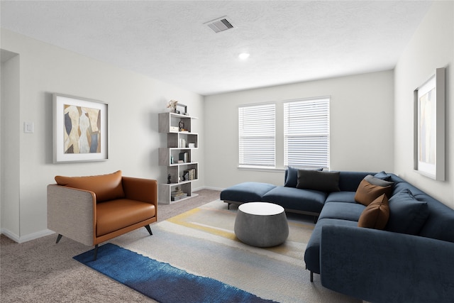 living room with carpet floors, visible vents, a textured ceiling, and baseboards