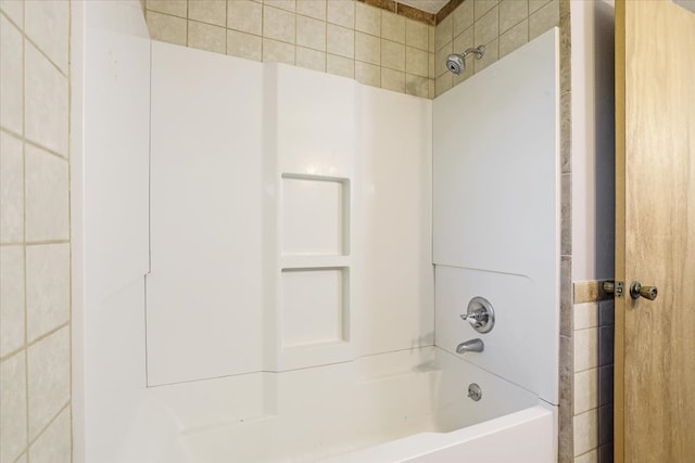 bathroom with shower / washtub combination