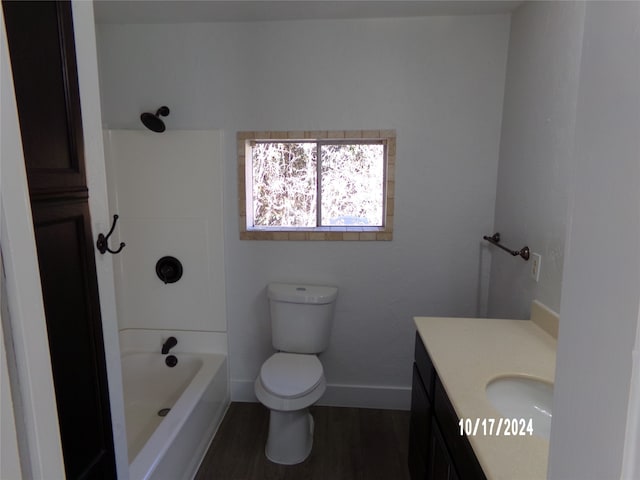 full bathroom featuring toilet, shower / washtub combination, vanity, and wood-type flooring