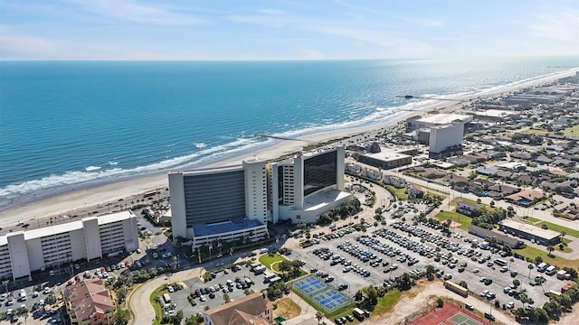 drone / aerial view with a view of the beach and a water view