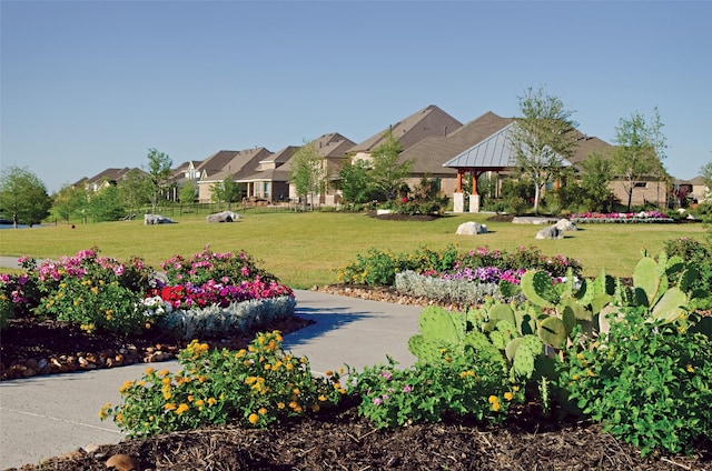 view of home's community featuring a gazebo and a lawn