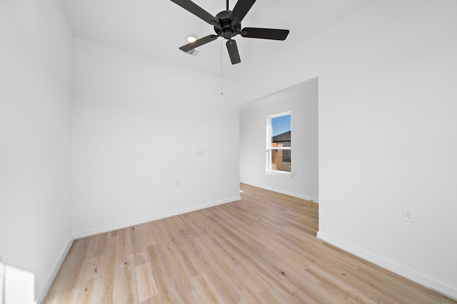 spare room with ceiling fan and light hardwood / wood-style floors