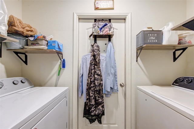 clothes washing area with independent washer and dryer