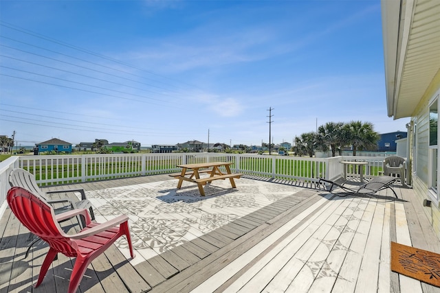 deck featuring a lawn