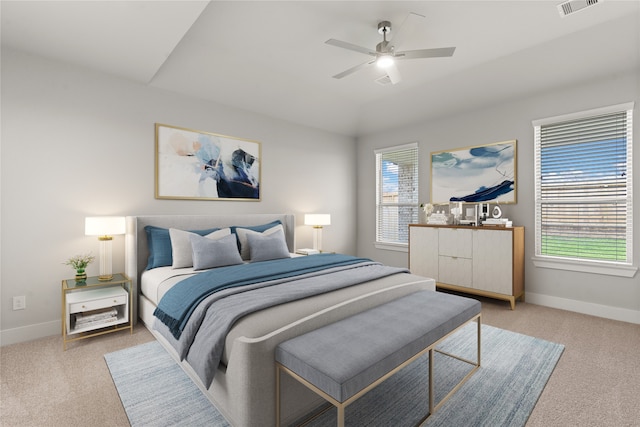 carpeted bedroom featuring ceiling fan