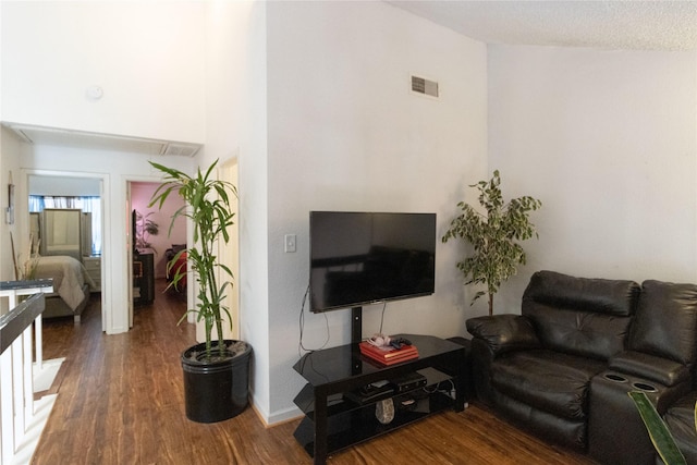 12638 Newbrook Dr, Houston, TX 77072 - living room with baseboards, visible vents, and wood finished floors