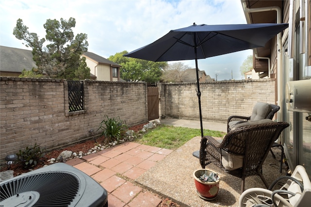 view of patio / terrace with central AC