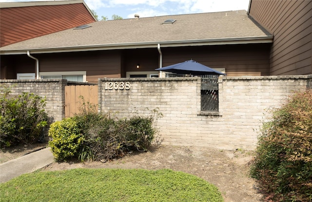 12638 Newbrook Dr, Houston, TX 77072 - view of home's exterior with fence