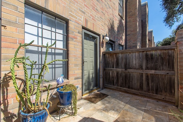 doorway to property featuring a patio