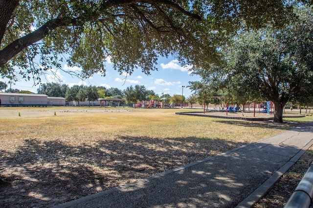 surrounding community with a lawn