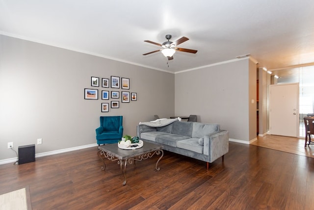 living room featuring crown molding, dark hardwood / wood-style flooring, and ceiling fan