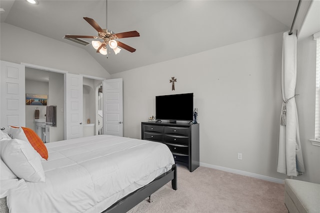 bedroom with ceiling fan, lofted ceiling, and light colored carpet