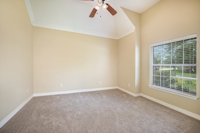 empty room with crown molding, carpet flooring, and ceiling fan