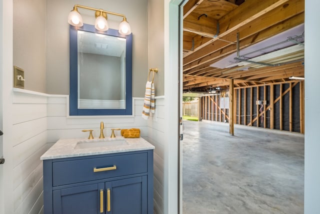 bathroom featuring vanity and concrete floors