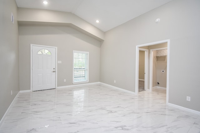 foyer entrance with lofted ceiling