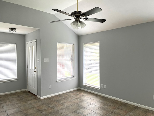 4219 Hermitage Hollow Ln, Kingwood, TX 77339 - spare room featuring a ceiling fan, baseboards, and vaulted ceiling