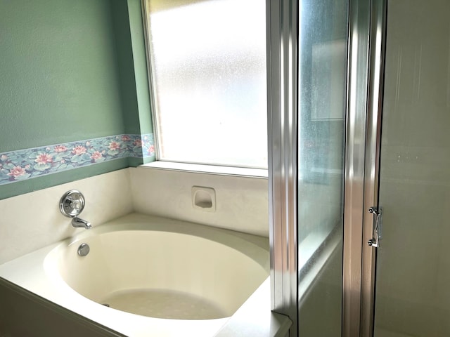 bathroom featuring a bathtub