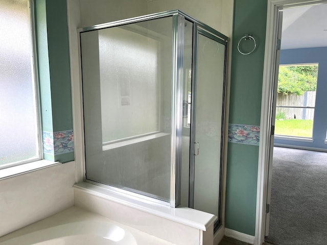 4219 Hermitage Hollow Ln, Kingwood, TX 77339 - bathroom featuring a shower stall and a bath