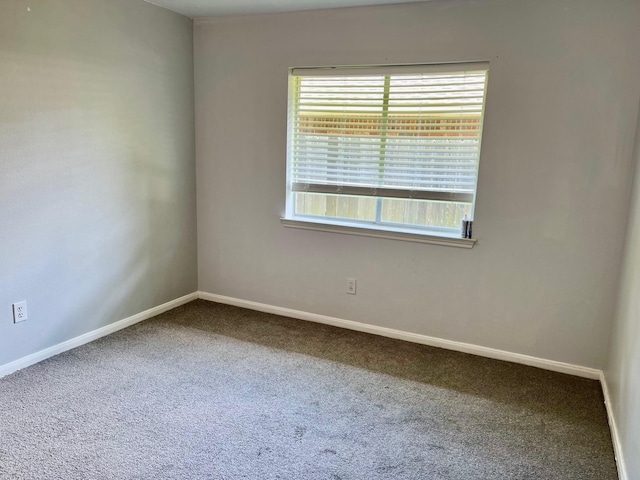 4219 Hermitage Hollow Ln, Kingwood, TX 77339 - empty room with carpet and baseboards