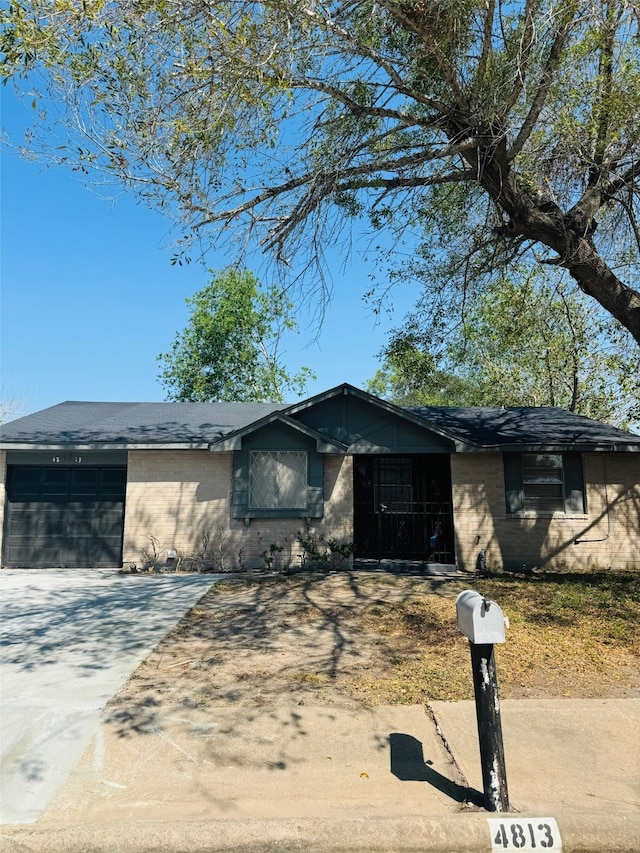 single story home featuring a garage