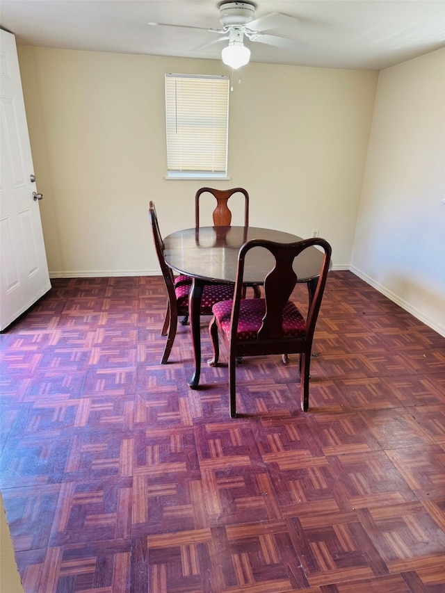 dining space featuring ceiling fan